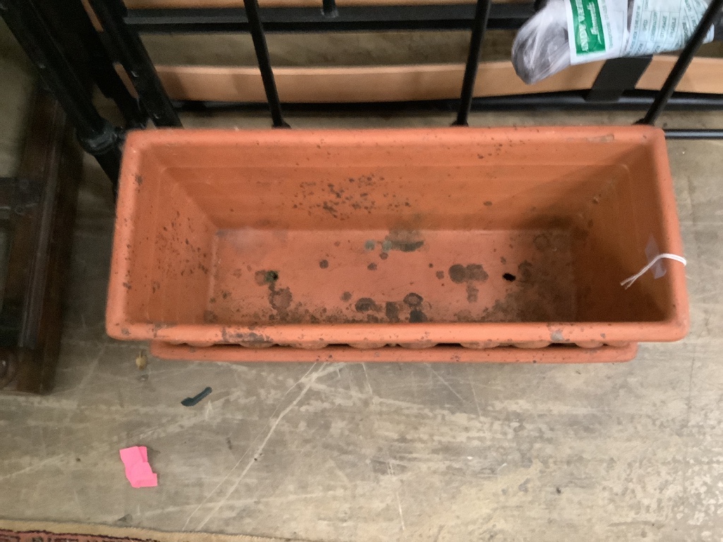 A pair of rectangular terracotta planters, width 52cm height 18cm